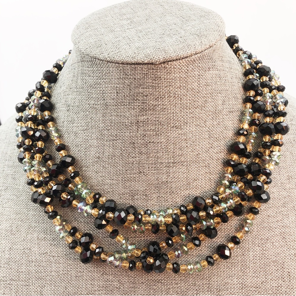 Austrian Crystal Necklace. In colours of black, blue and gold faceted beads.